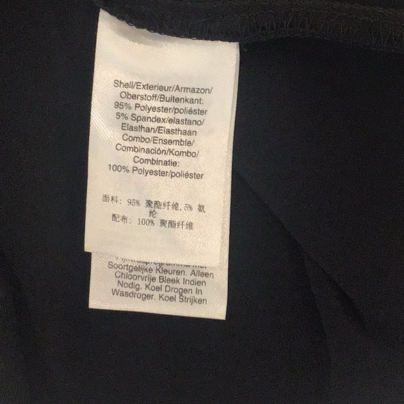 DKNY black asymmetrical top. NWT size XS, more like a small. - Picture 9 of 9